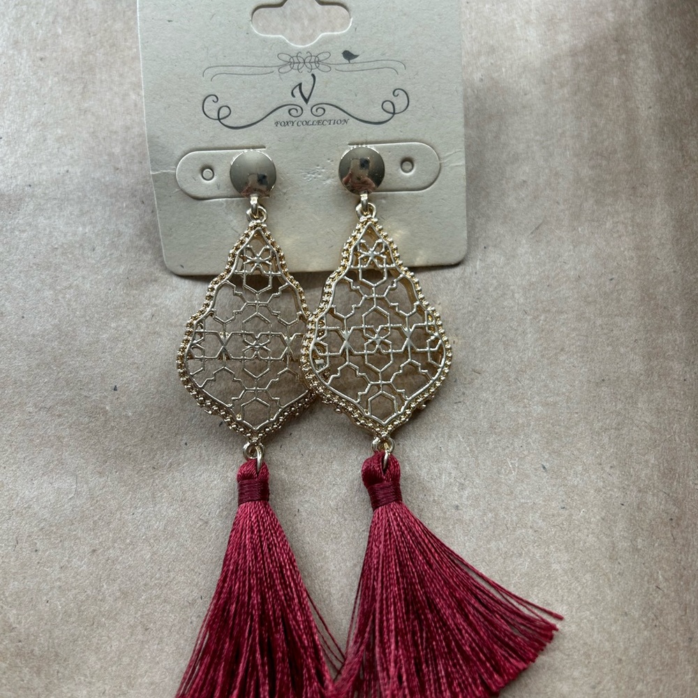 Never worn fringe earrings